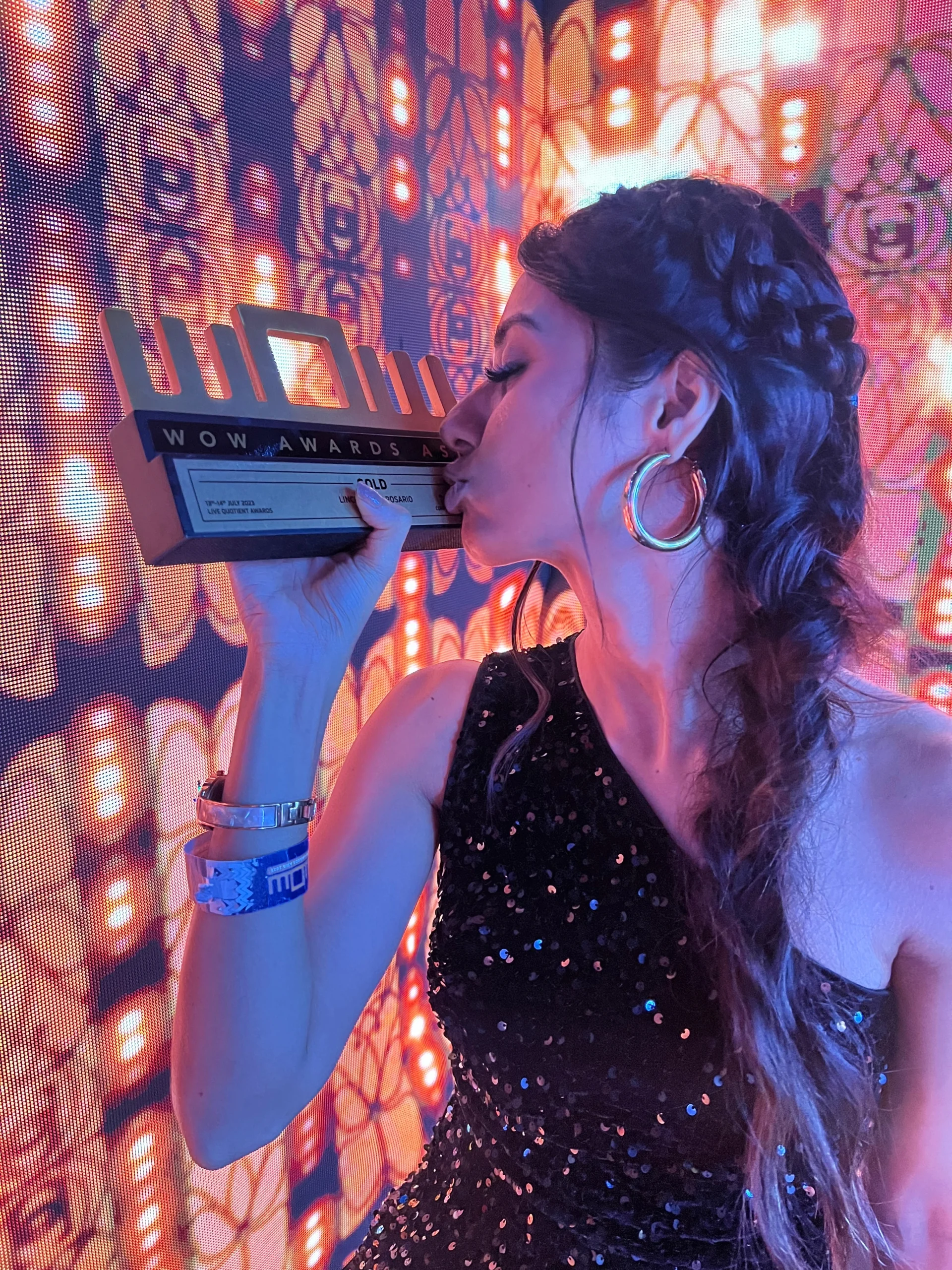 Lincia Rosario receiving Best Female Emcee — Corporate award